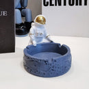 Cinzeiro decorativo de resina com astronauta de desenho animado