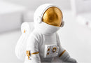 Cinzeiro decorativo de resina com astronauta de desenho animado